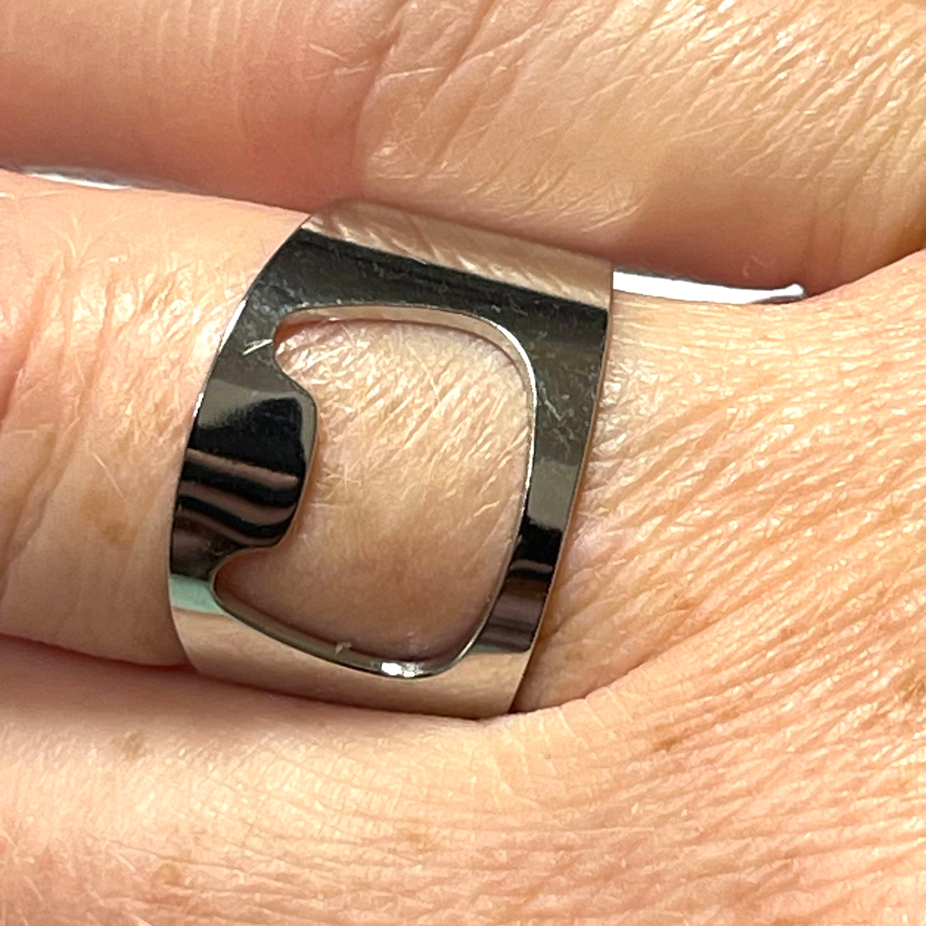 Ring: Stainless Steel Cat Head Ring in Silver, also serves as a bottle opener!